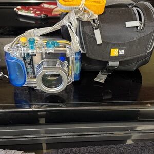 New Cannon WP-DC26 waterproof case with black camera case